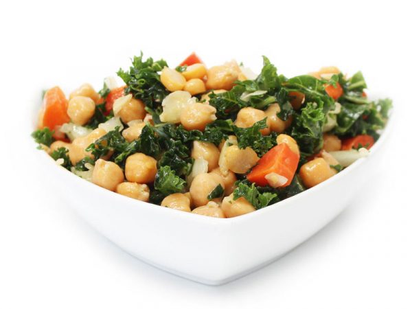 Chickpea Kale salad in a white bowl